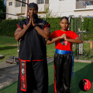 KUKIBO Grandmaster Bryan Campbell Alongside Student Lianne, Show Respect