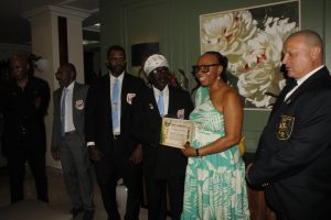 Jamaica Diaspora Magazine Founder Dr. Lola Cunningham Receiving Bas-I-Kyokushin Certificate