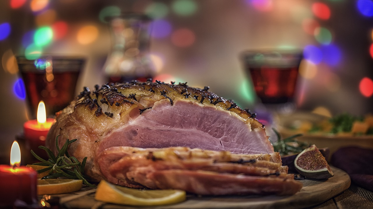 Glazed Holiday Ham with Cloves Served for Dinner
